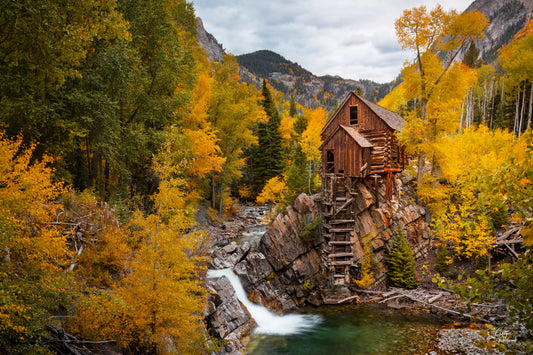 Historic Crystal Mill surrounded by golden aspens beside a turquoise mountain pool fine art photography print by Greg Westbrook