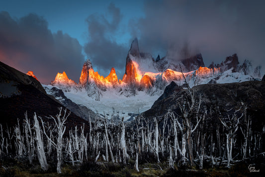 Snowy mountain landscape with glowing peaks at night fine art photography print by Greg Westbrook