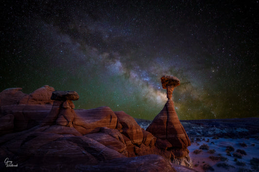 Milky Way galaxy arching over sandstone hoodoos in the Utah desert under a clear night sky fine art photography print by Greg Westbrook
